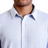 close up view of the collar and neck area of  a light blue button up knit shirt on a black male model