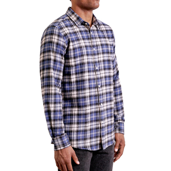 three quarters side view of men's long sleeve, slim fit,  blue and white plaid button up shirt on a black model