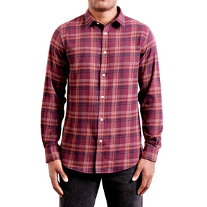 Men's classic maroon plaid flannel button up shirt long sleeve on a black model - front view
