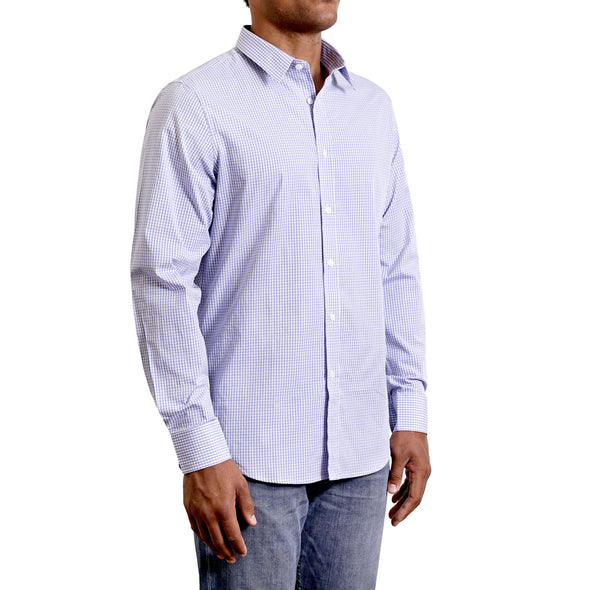 three quarters side view of men's long sleeve, slim fit, classic blue and white gingham print button up shirt on a black model. Blue is a medium bright blue color and gingham is a medium sized print