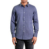 A solid navy colored button up shirt long sleeve made from organic cotton fabric on a black male model - front view