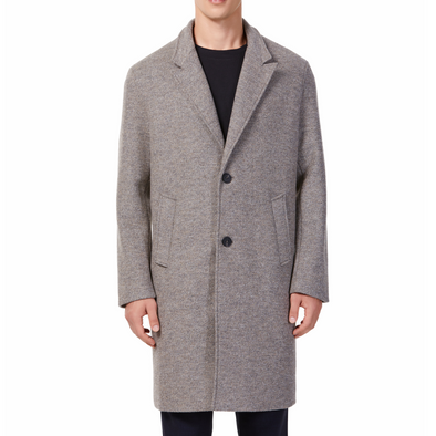 Men's long sleeve beige wool blend overcoat with 2 buttons at the front closer, large welt waist pockets and slightly oversized on a model - front view
