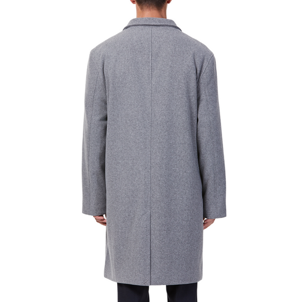 Men's long sleeve grey wool blend overcoat with 2 buttons at the front closer, large welt waist pockets and slightly oversized on a model - back view