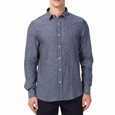 Men's textured flecked black linen long sleeve button up shirt with a pointed collar on a model. Image is cropped to the torso and model is facing straight forward