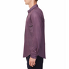 Men's maroon colored shirt with a small geometric black print button up shirt long sleeve made from knit fabric on a model - side view