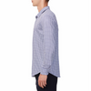 Men's white button up shirt with a navy honeycomb pattern all over, has long sleeves, button up front and pointed collar. made from knit fabric on a model - side view