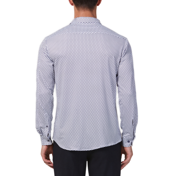 Men's white button up shirt with a navy honeycomb pattern all over, has long sleeves, button up front and pointed collar. made from knit fabric on a model - back view