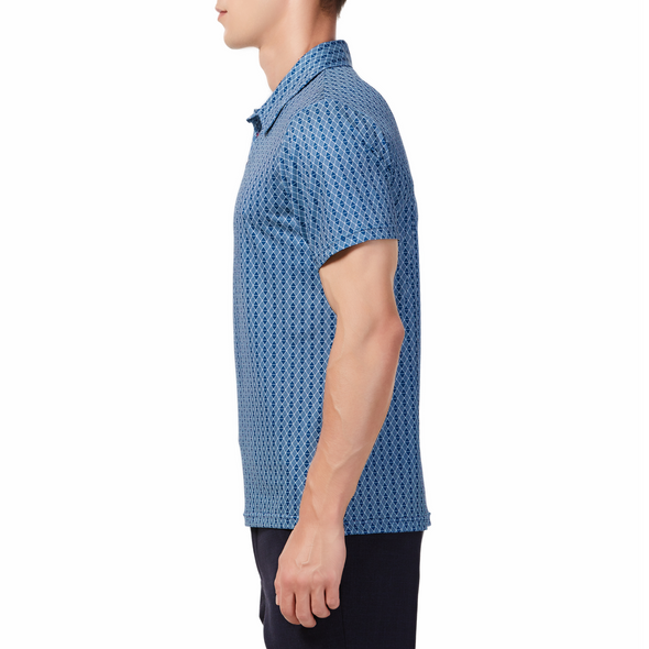 Men's Short sleeve polo shirt in a blue diamond geo print small stripes inside someof the diamonds. Has a 3 button front colosure and pointed blue collar made from knit fabric on a model - side view